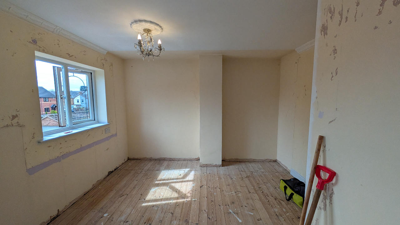 Bedroom stripped out near Worksop — fitted wardrobes and old carpet removed, walls and floor left ready to fit